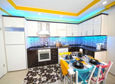 Furnished apartment 2 + 1 in a residence with a swimming pool in the western part of Mahmutlar ID-8480 фото-3