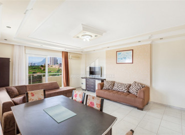 Apartment with two bedrooms, furniture and appliances overlooking the mountains in Mahmutlar ID-8517 фото-4