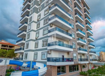 Two bedroom duplex, with furniture and appliances, in a residential residence with good facilities, Mahmutlar, Alanya, 120 m2 ID-8541 фото-1