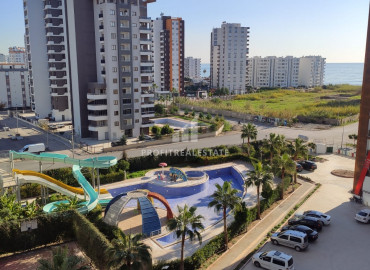 View apartment 2 + 1 200m from the sea in the area of Mersin - Tece, in a residence with extensive facilities ID-8547 фото-1