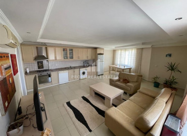 Furnished two bedroom apartment 120m² on the main street of Mahmutlar, 100m from the sea ID-8559 фото-1