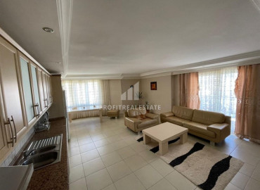 Furnished two bedroom apartment 120m² on the main street of Mahmutlar, 100m from the sea ID-8559 фото-2