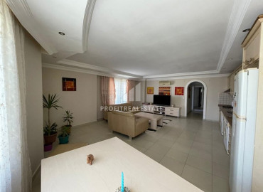 Furnished two bedroom apartment 120m² on the main street of Mahmutlar, 100m from the sea ID-8559 фото-3