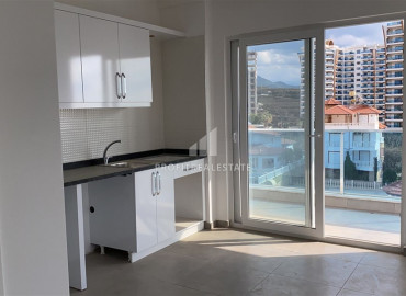 Spacious apartment 2 + 1 in a residence with rich facilities, overlooking the sea and mountains in Mahmutlar ID-8560 фото-2
