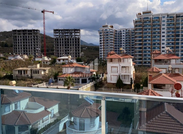 Spacious apartment 2 + 1 in a residence with rich facilities, overlooking the sea and mountains in Mahmutlar ID-8560 фото-3