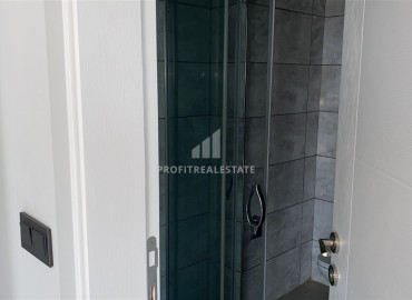 Spacious apartment 2 + 1 in a residence with rich facilities, overlooking the sea and mountains in Mahmutlar ID-8560 фото-5