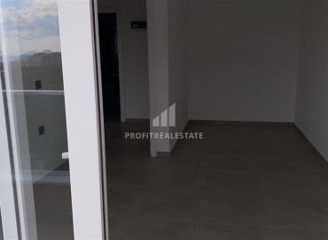 Spacious apartment 2 + 1 in a residence with rich facilities, overlooking the sea and mountains in Mahmutlar ID-8560 фото-10