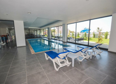 Spacious apartment 2 + 1 in a residence with rich facilities, overlooking the sea and mountains in Mahmutlar ID-8560 фото-14