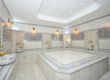 Spacious apartment 2 + 1 in a residence with rich facilities, overlooking the sea and mountains in Mahmutlar ID-8560 фото-15