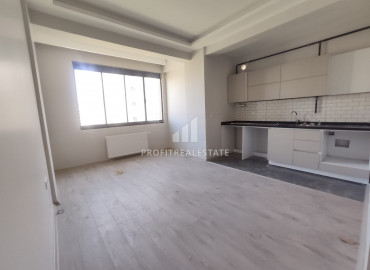 Квартира 1+1 с чистовой отделкой в новом доме в районе Мерсина Мезитли по отличной цене ID-8563 фото-1