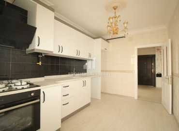 Spacious apartment 3 + 1 with a separate kitchen, renovated in Mezitli, Davultepe district, 500m from the sea ID-8590 фото-1