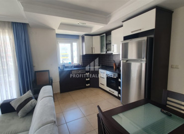 Furnished two bedroom apartment, 250 meters from the center of Mahmutlar, Alanya ID-8594 фото-6