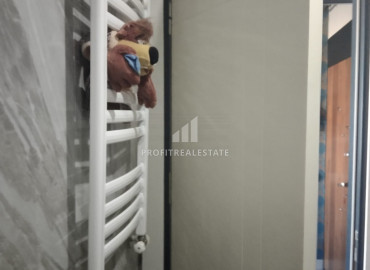 Двухкомнатная квартира с ремонтом в газифицированной резиденции в Мезитли, Мерсин ID-8600 фото-10