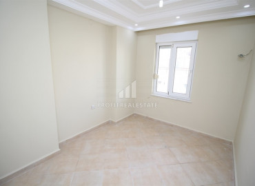 Apartment with two bedrooms, on the first coastline, Tosmur, Alanya, 100 m2 ID-8602 фото-11