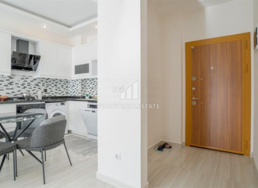 Furnished apartment 1 + 1, with an area of 65m² in a new residence with facilities in Mahmutlar ID-8605 фото-4