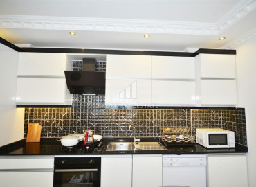 Ready to move in, two bedroom apartment on the main street of Mahmutlar, 50m from the sea ID-8626 фото-8