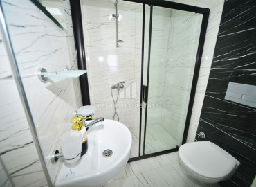 Ready to move in, two bedroom apartment on the main street of Mahmutlar, 50m from the sea ID-8626 фото-22