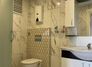 Apartment 2 + 1 with a good repair and sea views on the main street of Mahmutlar ID-8630 фото-7