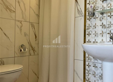 Apartment 2 + 1 with a good repair and sea views on the main street of Mahmutlar ID-8630 фото-12