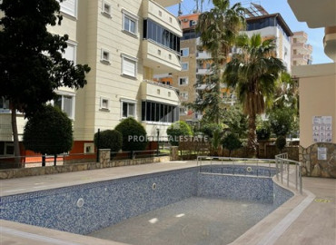 Apartment 2 + 1 with a good repair and sea views on the main street of Mahmutlar ID-8630 фото-16