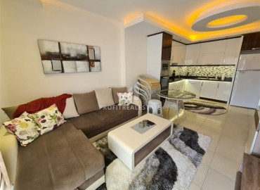 In a luxury residence: ready to move in, 1 + 1 apartment 300m from the sea in Mahmutlar ID-8638 фото-2