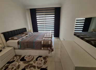 In a luxury residence: ready to move in, 1 + 1 apartment 300m from the sea in Mahmutlar ID-8638 фото-8