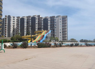 Видовая квартира с двумя спальнями в комплексе с бассейном в 80м от моря в районе Мерсина – Каргыпынары ID-8640 фото-1
