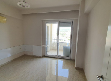 View apartment with two bedrooms in a residence with a swimming pool 80m from the sea in the area of Mersin - Kargipinari ID-8640 фото-7