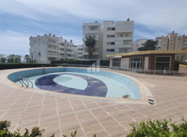 View apartment with two bedrooms in a residence with a swimming pool 80m from the sea in the area of Mersin - Kargipinari ID-8640 фото-18