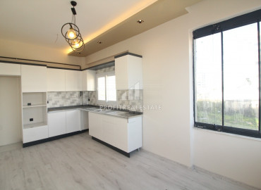 Spacious apartment 3 + 1 in a gasified residence with a swimming pool in the Soli neighborhood, Mezitli ID-8692 фото-3