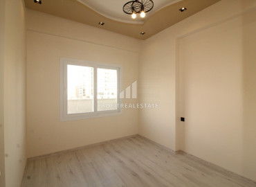 Spacious apartment 3 + 1 in a gasified residence with a swimming pool in the Soli neighborhood, Mezitli ID-8692 фото-11