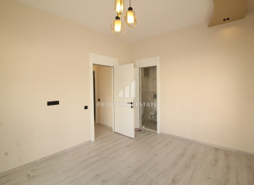 Spacious apartment 3 + 1 in a gasified residence with a swimming pool in the Soli neighborhood, Mezitli ID-8692 фото-13