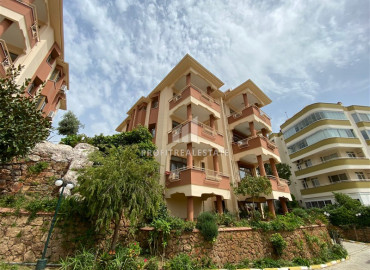 Furnished garden duplex 2 + 1 with a separate kitchen, in a well-maintained residence 600m from the sea in Mahmutlar ID-8699 фото-1