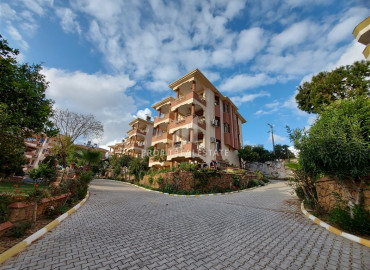 Furnished garden duplex 2 + 1 with a separate kitchen, in a well-maintained residence 600m from the sea in Mahmutlar ID-8699 фото-2