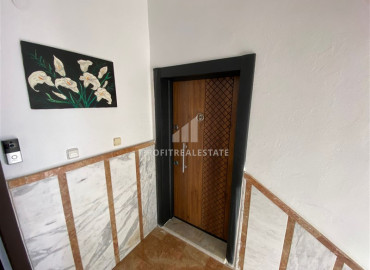 Furnished garden duplex 2 + 1 with a separate kitchen, in a well-maintained residence 600m from the sea in Mahmutlar ID-8699 фото-3