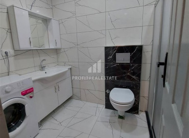 Furnished garden duplex 2 + 1 with a separate kitchen, in a well-maintained residence 600m from the sea in Mahmutlar ID-8699 фото-9