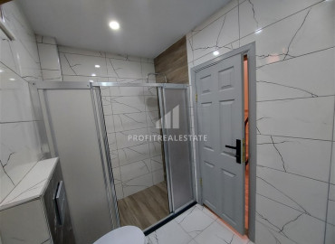 Furnished garden duplex 2 + 1 with a separate kitchen, in a well-maintained residence 600m from the sea in Mahmutlar ID-8699 фото-12