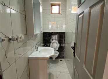 Furnished garden duplex 2 + 1 with a separate kitchen, in a well-maintained residence 600m from the sea in Mahmutlar ID-8699 фото-14