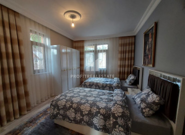 Furnished garden duplex 2 + 1 with a separate kitchen, in a well-maintained residence 600m from the sea in Mahmutlar ID-8699 фото-15