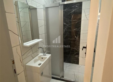 Furnished garden duplex 2 + 1 with a separate kitchen, in a well-maintained residence 600m from the sea in Mahmutlar ID-8699 фото-17