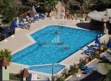 Furnished garden duplex 2 + 1 with a separate kitchen, in a well-maintained residence 600m from the sea in Mahmutlar ID-8699 фото-22