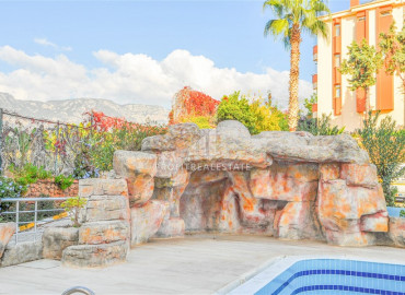 Furnished garden duplex 2 + 1 with a separate kitchen, in a well-maintained residence 600m from the sea in Mahmutlar ID-8699 фото-29