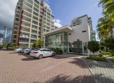 Two bedroom apartment with a separate kitchen, 125m² in the central part of Mahmutlar, 300m from the coast ID-8704 фото-1