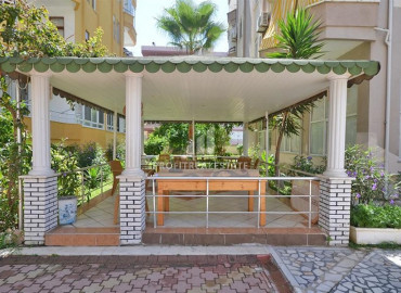 Apartment with two bedrooms and a separate kitchen 100m from the sea in Mahmutlar ID-8706 фото-9