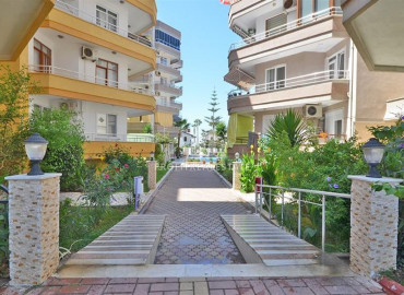 Apartment with two bedrooms and a separate kitchen 100m from the sea in Mahmutlar ID-8706 фото-11