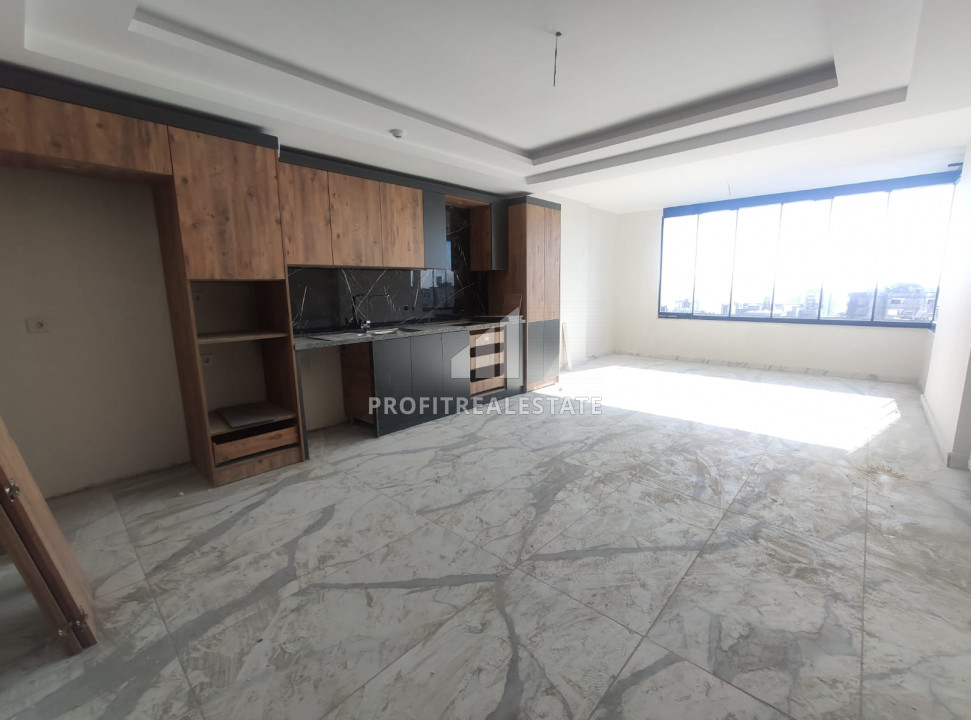 Spacious apartment 2 + 1 with sea views in a new residence with a swimming pool, in the area of Mersin - Soli ID-8729 фото-2