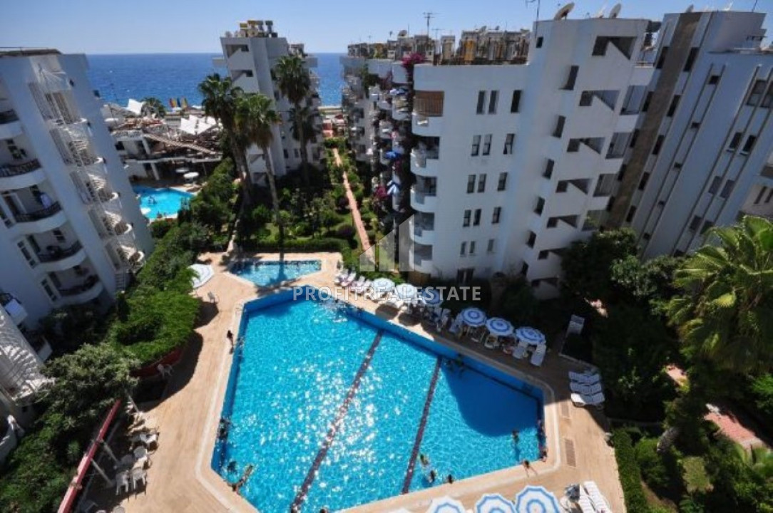 Furnished two-bedroom apartment in a cozy residence by the sea in Mahmutlar ID-8735 фото-1