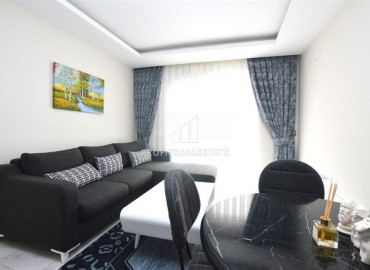 One bedroom furnished apartment in Mahmutlar, Alanya with a large balcony near the sea. ID-8750 фото-1