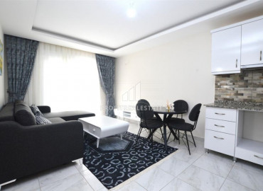 One bedroom furnished apartment in Mahmutlar, Alanya with a large balcony near the sea. ID-8750 фото-11