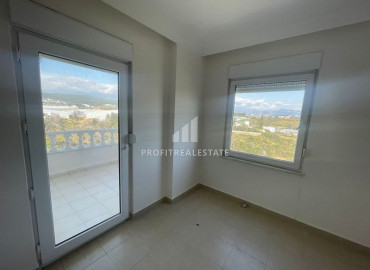 Недорогая четырехкомнатная квартира в восточной части района Авсаллар, с видом на море и горы. ID-8773 фото-19